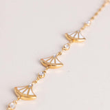 GUESS Fan Gold-Tone Charm Bracelet