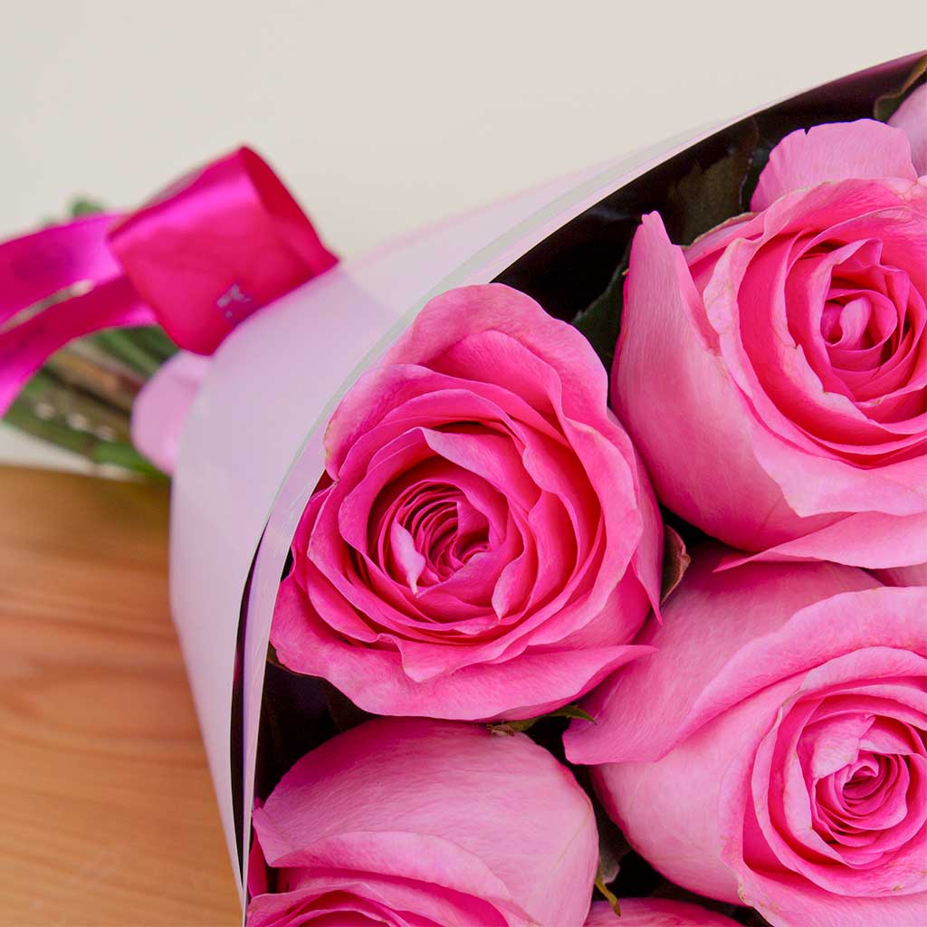 Hand Bouquet of 12 Pink Roses
