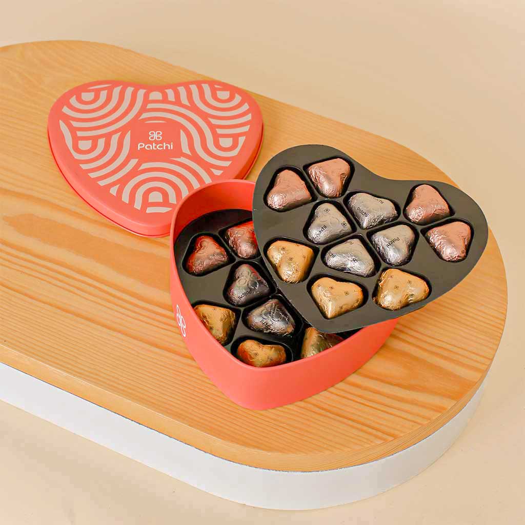 Patchi Tin Box of 22 Pieces and 20 red roses