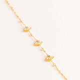 GUESS Fan Gold-Tone Charm Bracelet