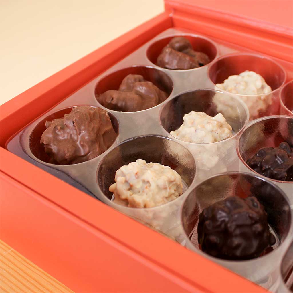 Patchi 46-Piece Box - Les Gourmets with Black Vase and Red Roses