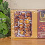 Zadna dates and a bag of white roses