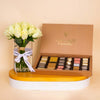 Chocolate Factory Luxe Box – 28 Pieces & White Roses Vase