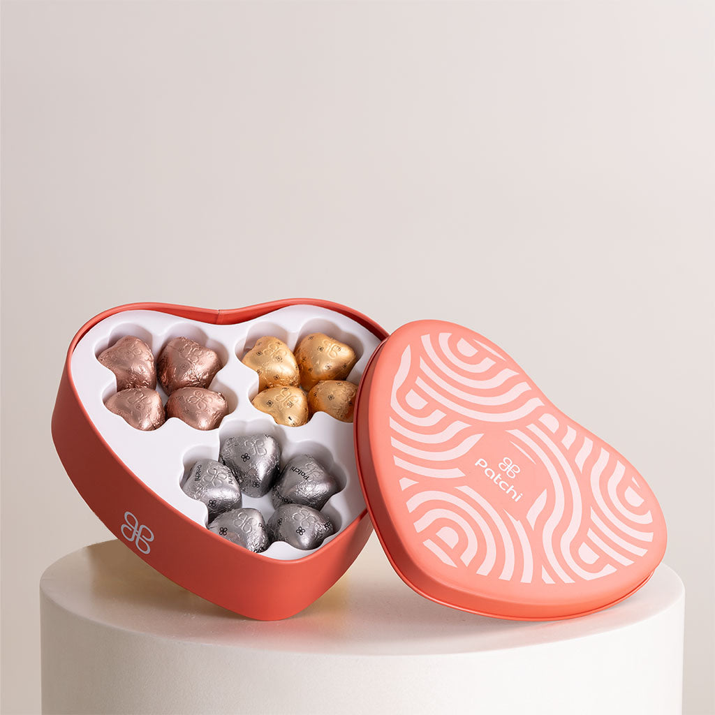 Patchi Tin Box 245g and Red Botanica Box and Flowrista Candle