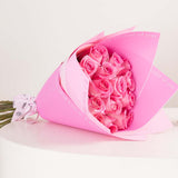 GUESS Fan Gold-Tone Charm Bracelet & Pink Roses Bouquet