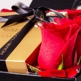 House of Cocoa Chocolate Box 16 pieces and 15 red roses